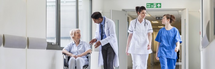 Doctor in hospital corridor